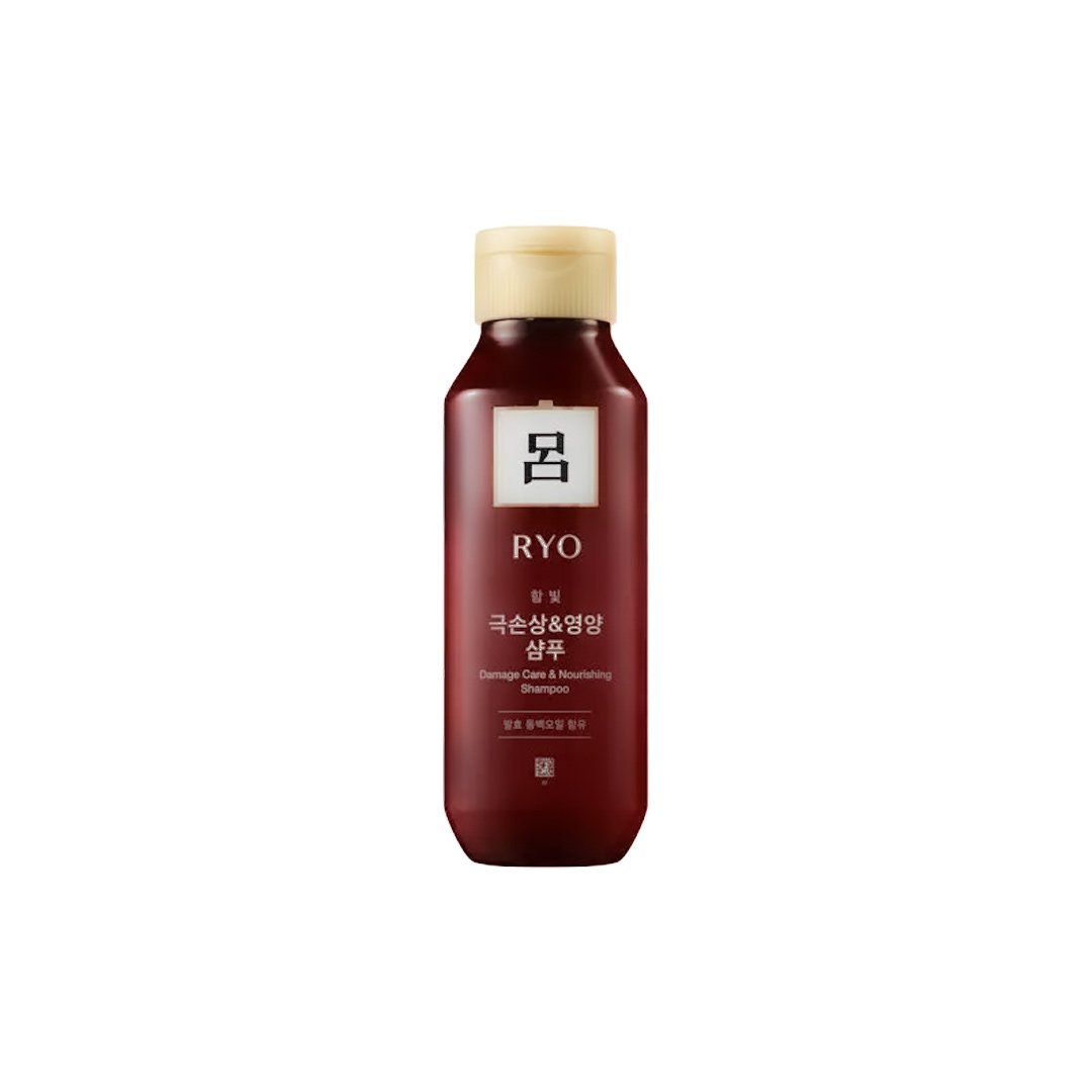 Red shampoo bottle with beige cap on a white background